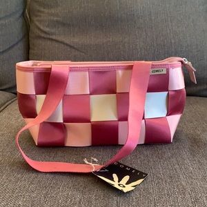 Brand new Comely seatbelt purse, never used!